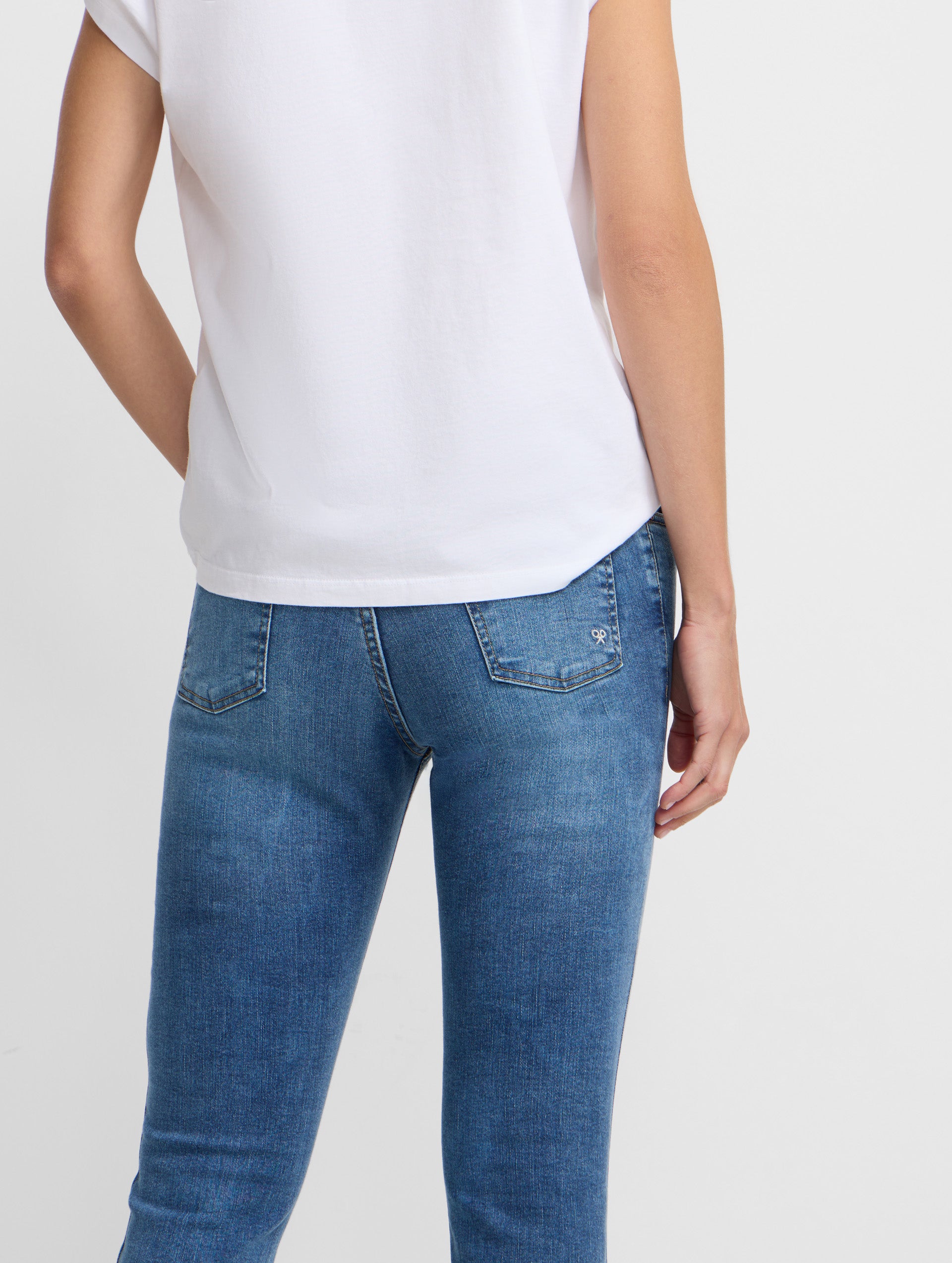 Calças de mulher slim fit ganga média