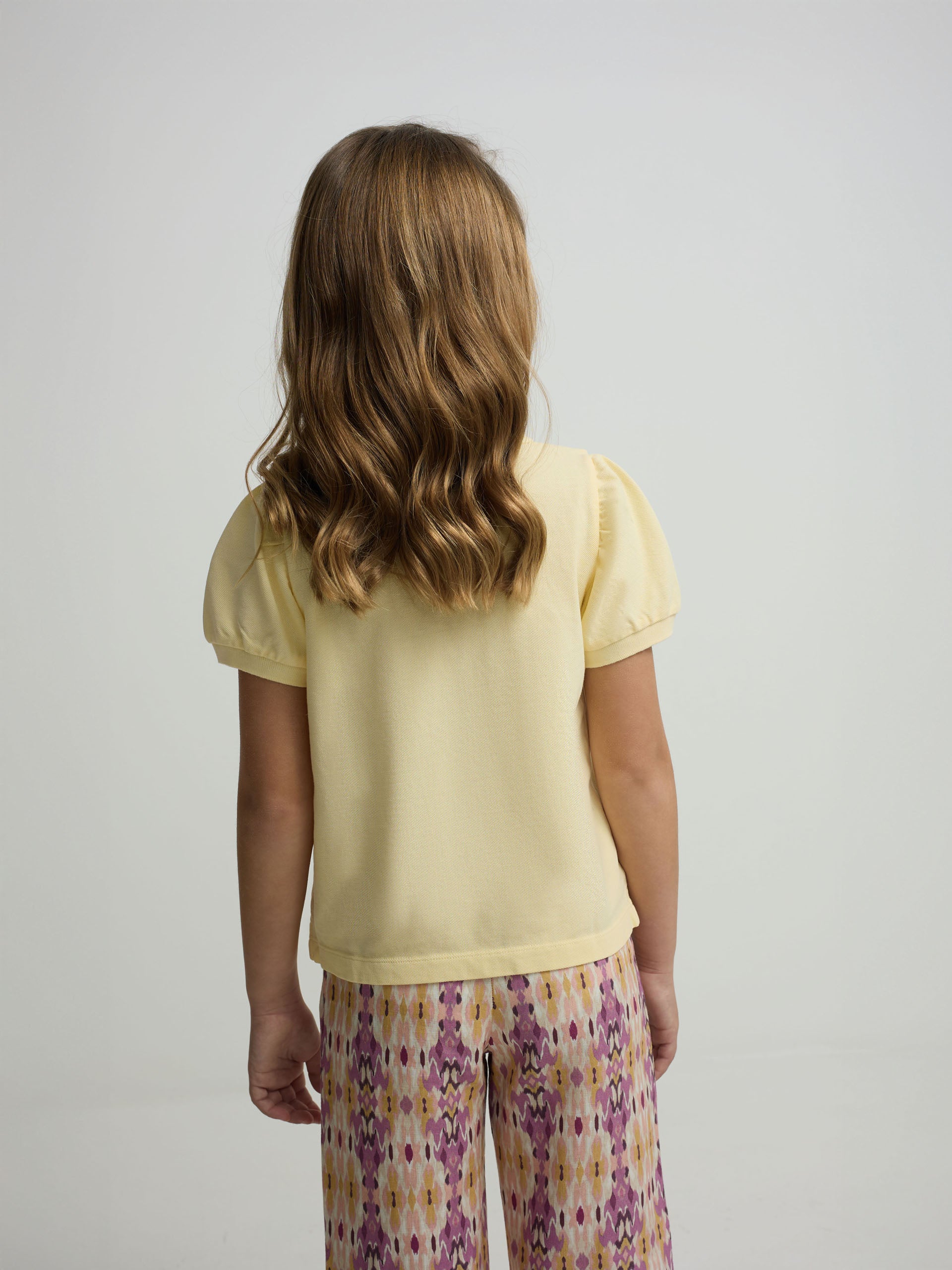 Puff sleeve yellow girl polo