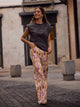 Pantalon denim estampado ikat rosas