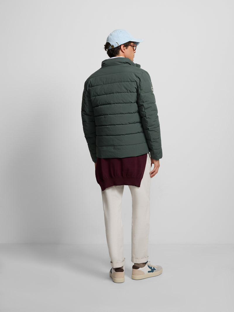 Green quilted technical coat