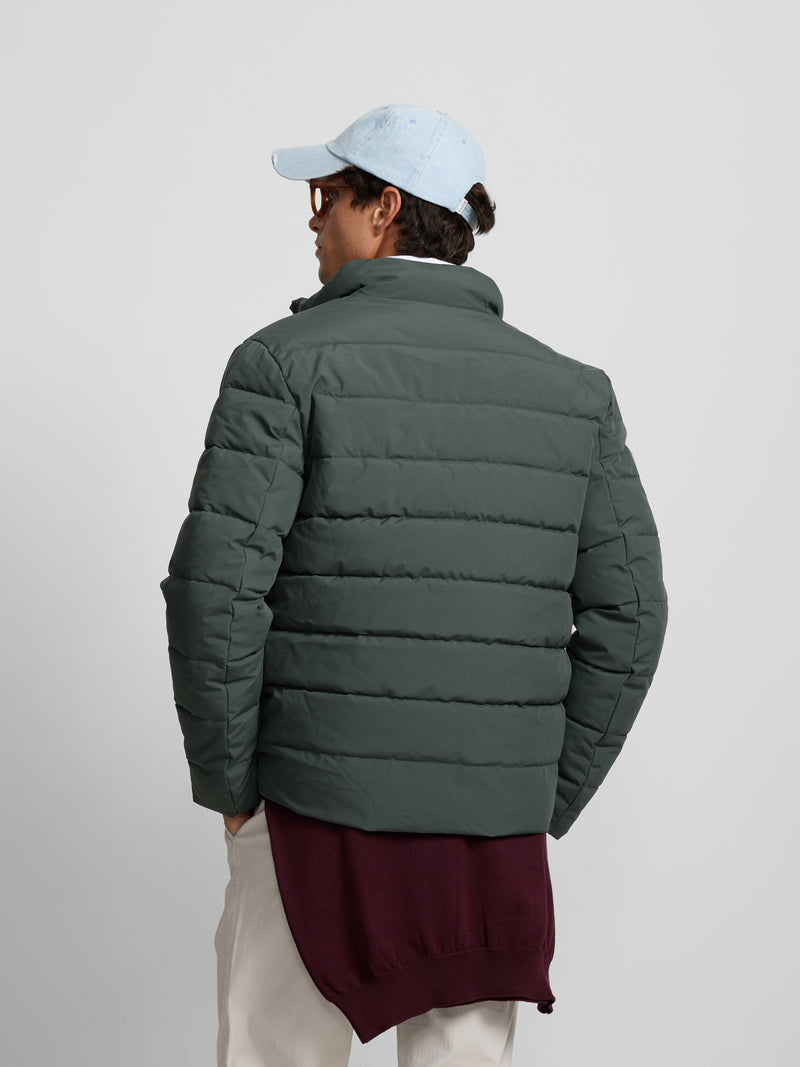 Green quilted technical coat