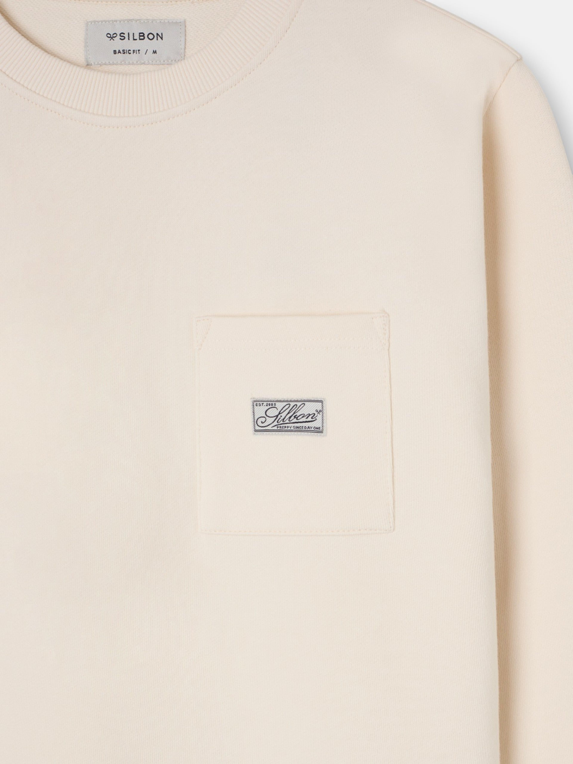 Sweatshirt bolso etiqueta creme
