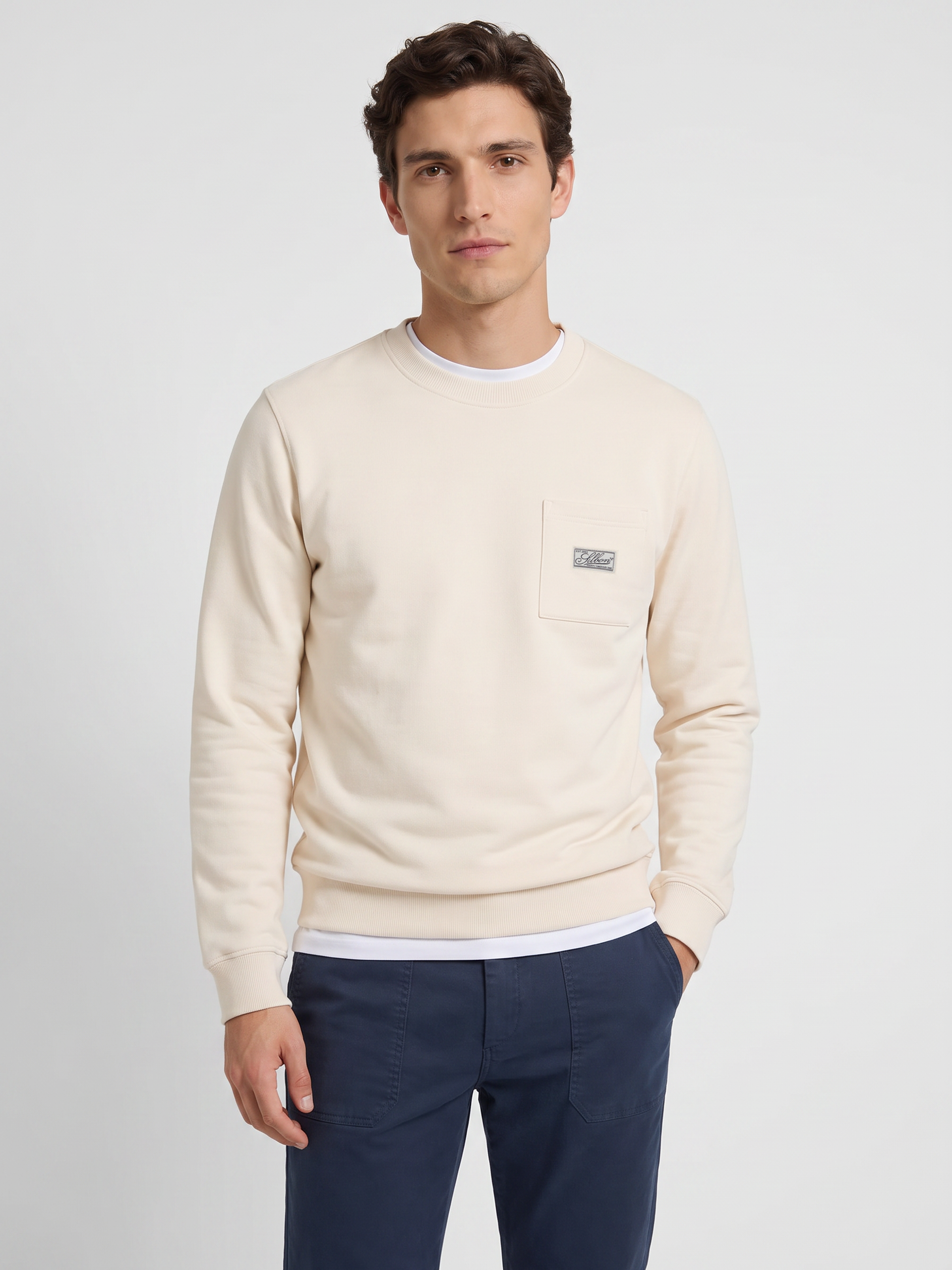 Sudadera bolsillo etiqueta crema