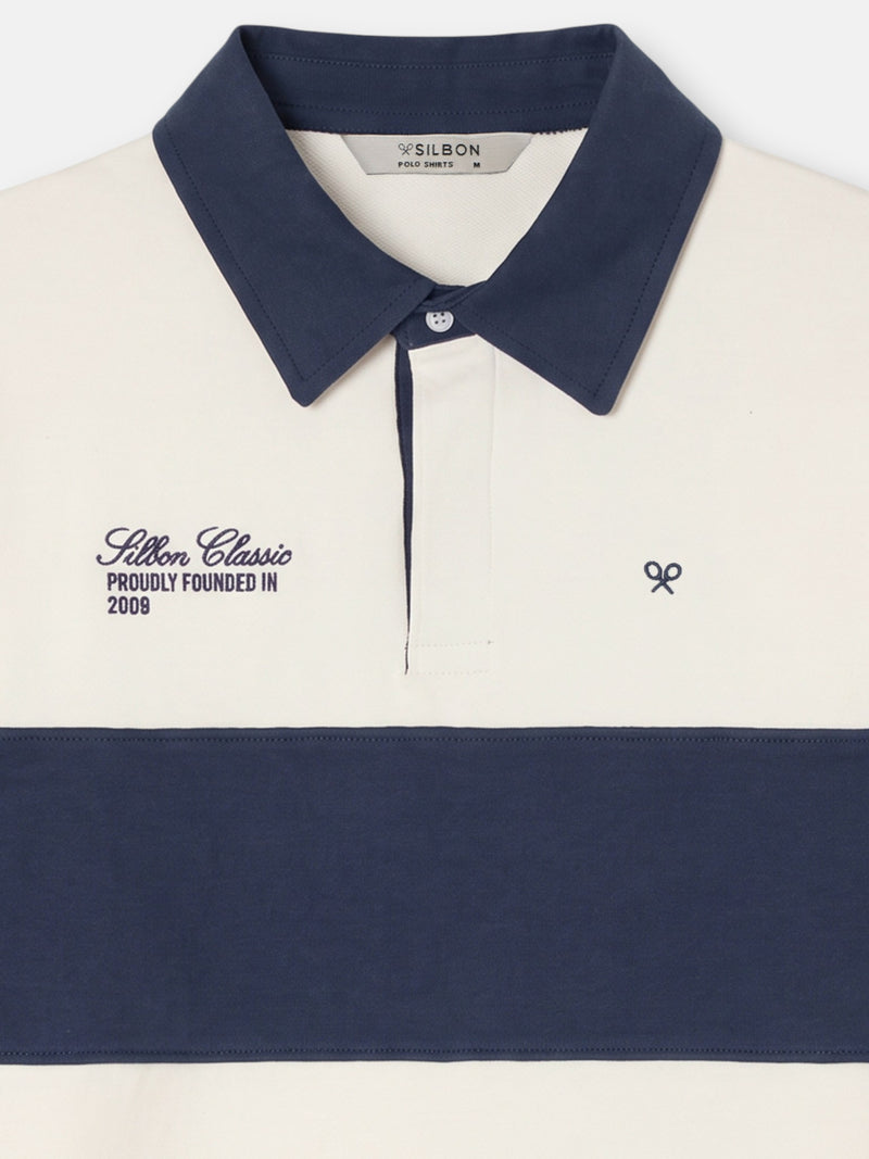 Polo à manches longues rayé bleu marine et crème