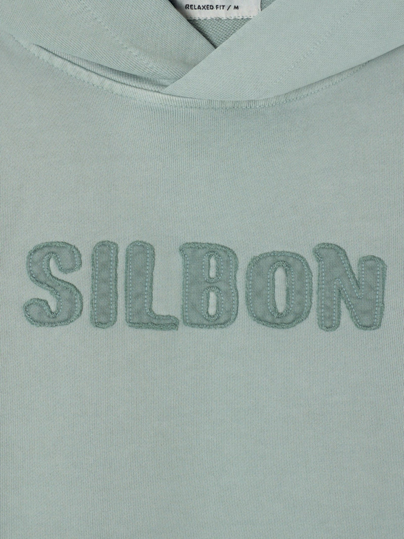 Sweatshirt com capuz e emblema em tom verde claro