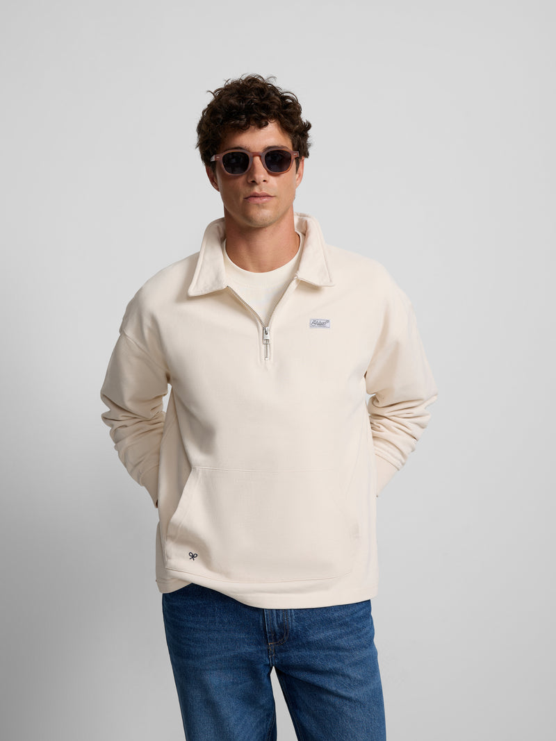 Sudadera relaxed fit media cremallera etiqueta crema