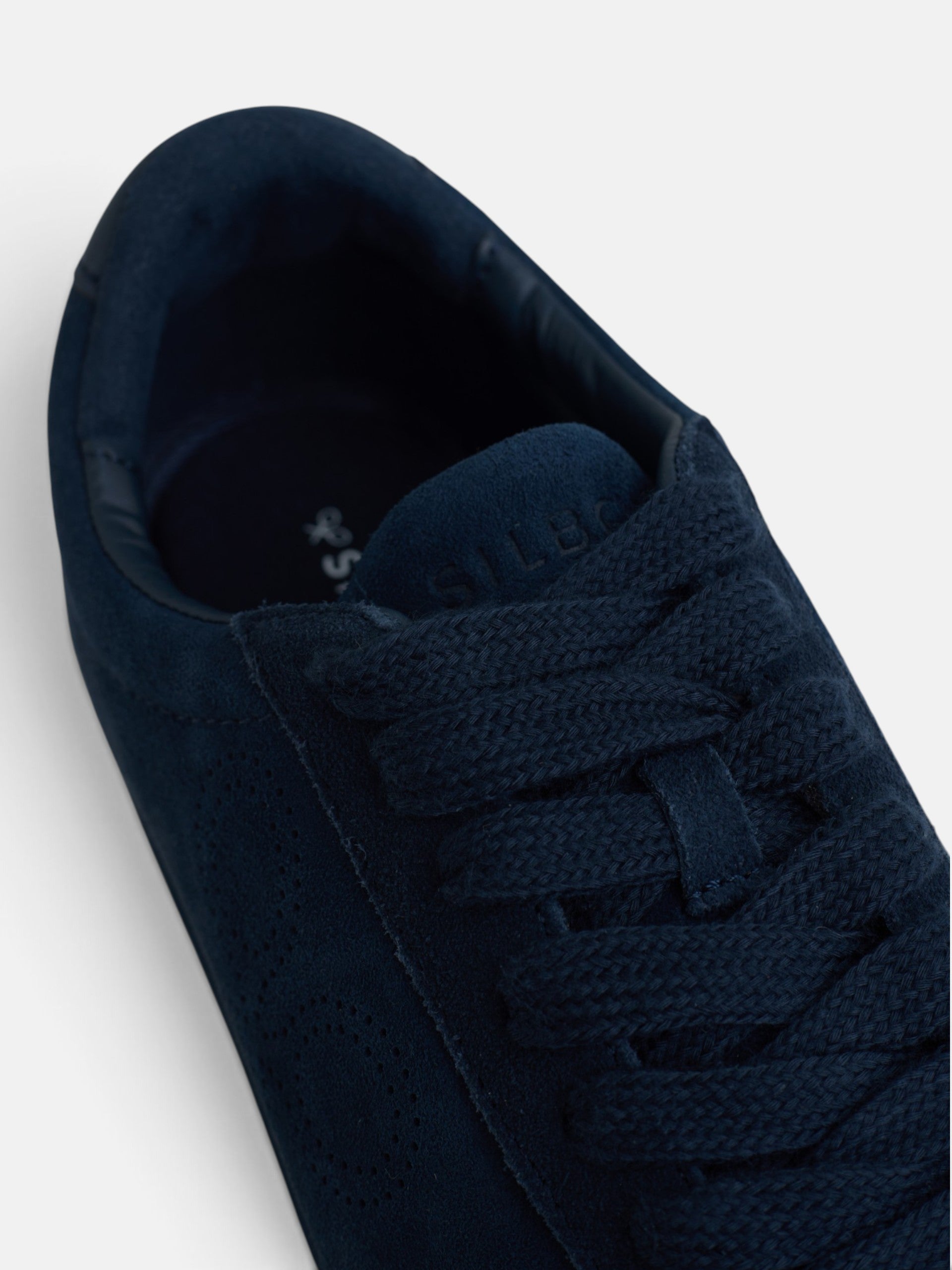 Zapatilla serraje logo perforado azul marino