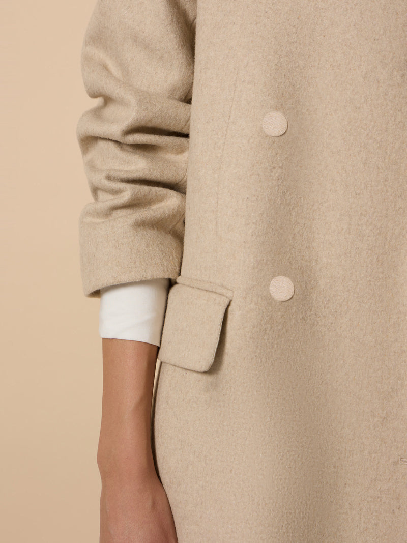Long unique double-breasted beige coat