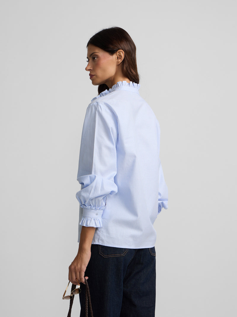 Shirt with ruffled collar and cuff detail, light blue stripes