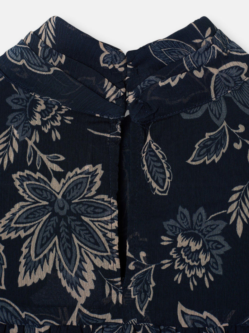 Blue floral print blouse with tied sleeves