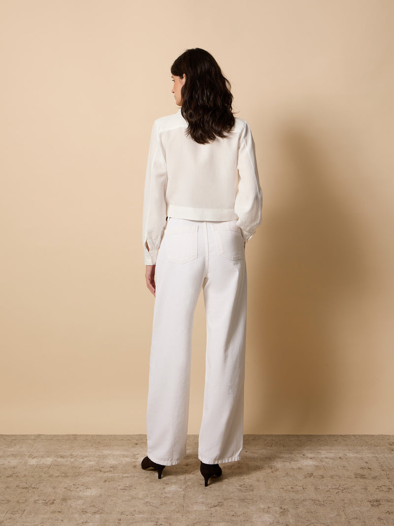 Wide leg trousers with unique pleats in white