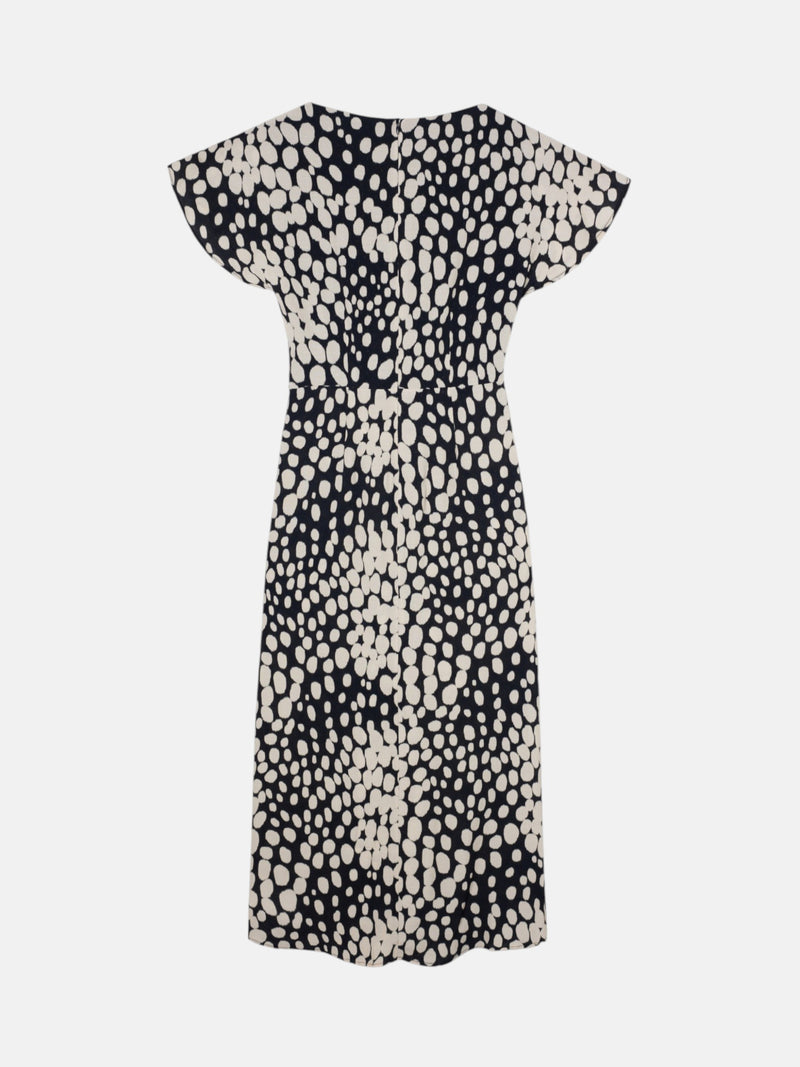 White and black polka dot draped midi dress