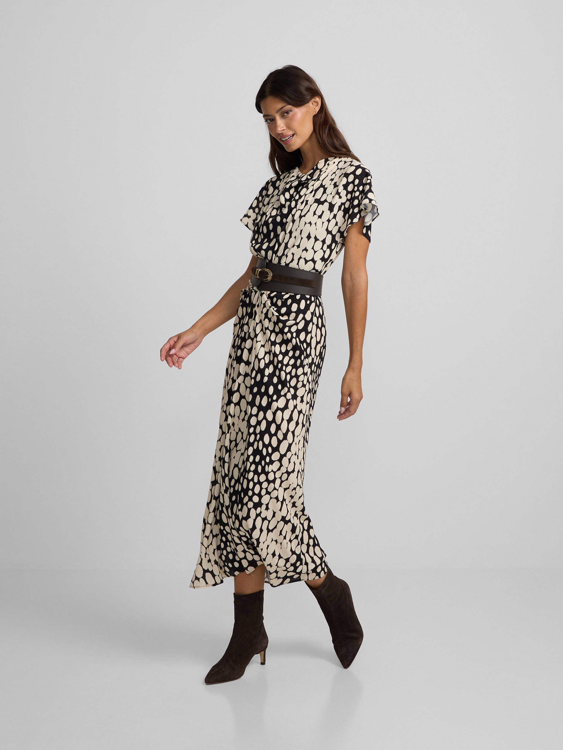 White and black polka dot draped midi dress