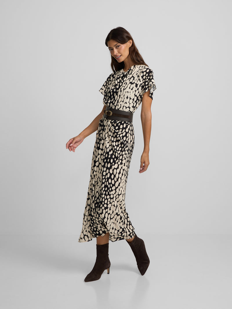 White and black polka dot draped midi dress