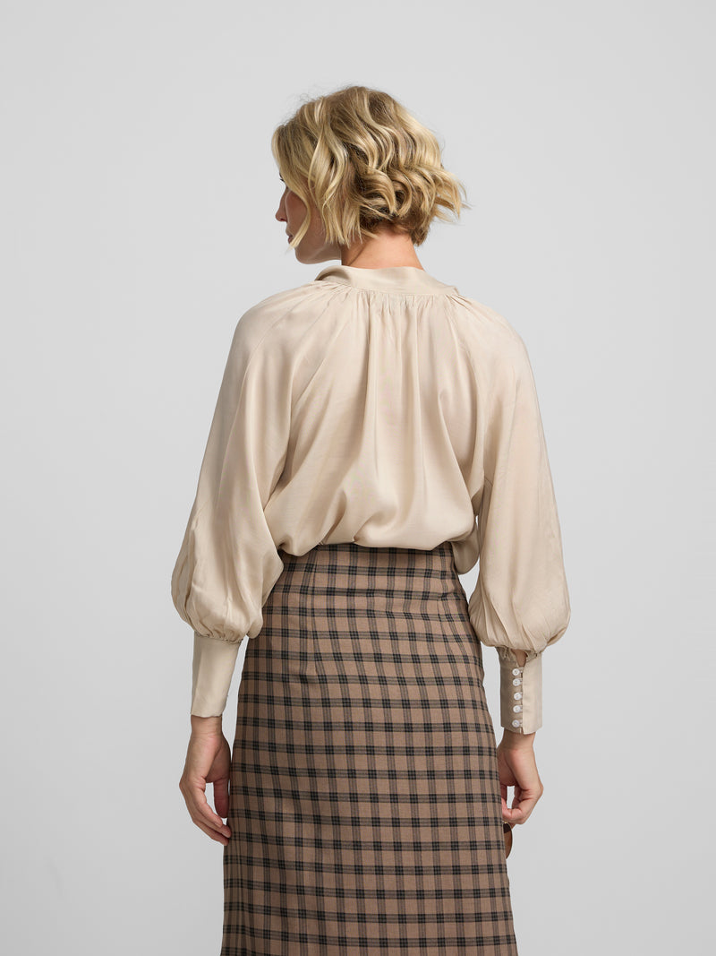 Blouse romantique nouée écrue