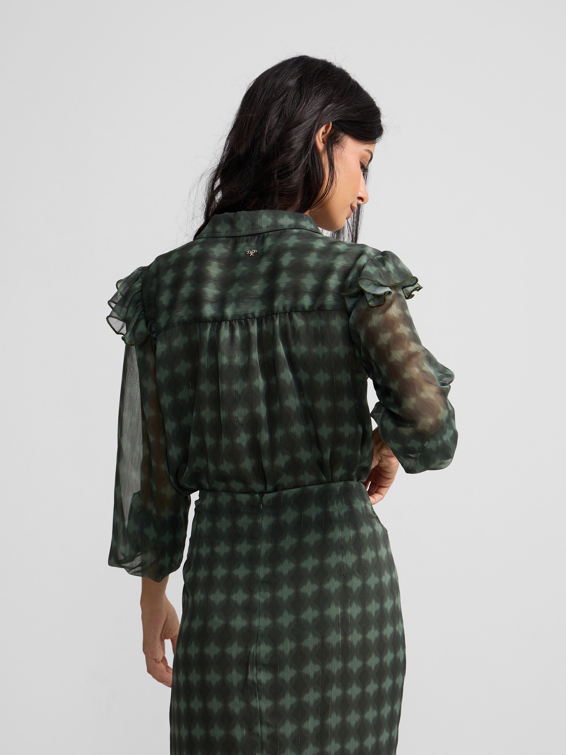 Green ethnic print ruffle blouse