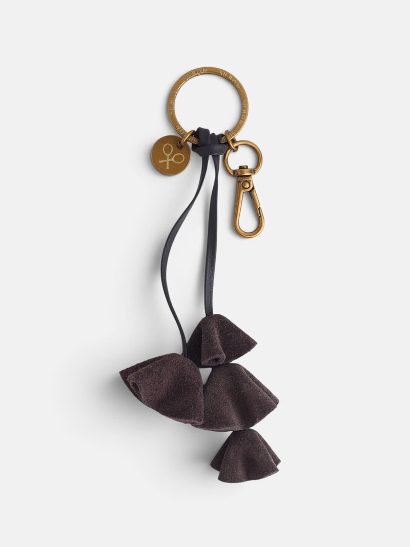 Brown leather keychain with flowers