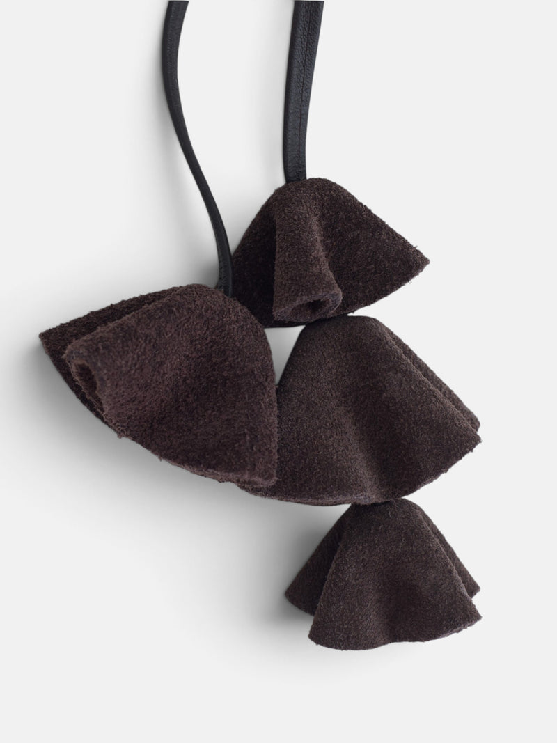 Brown leather keychain with flowers