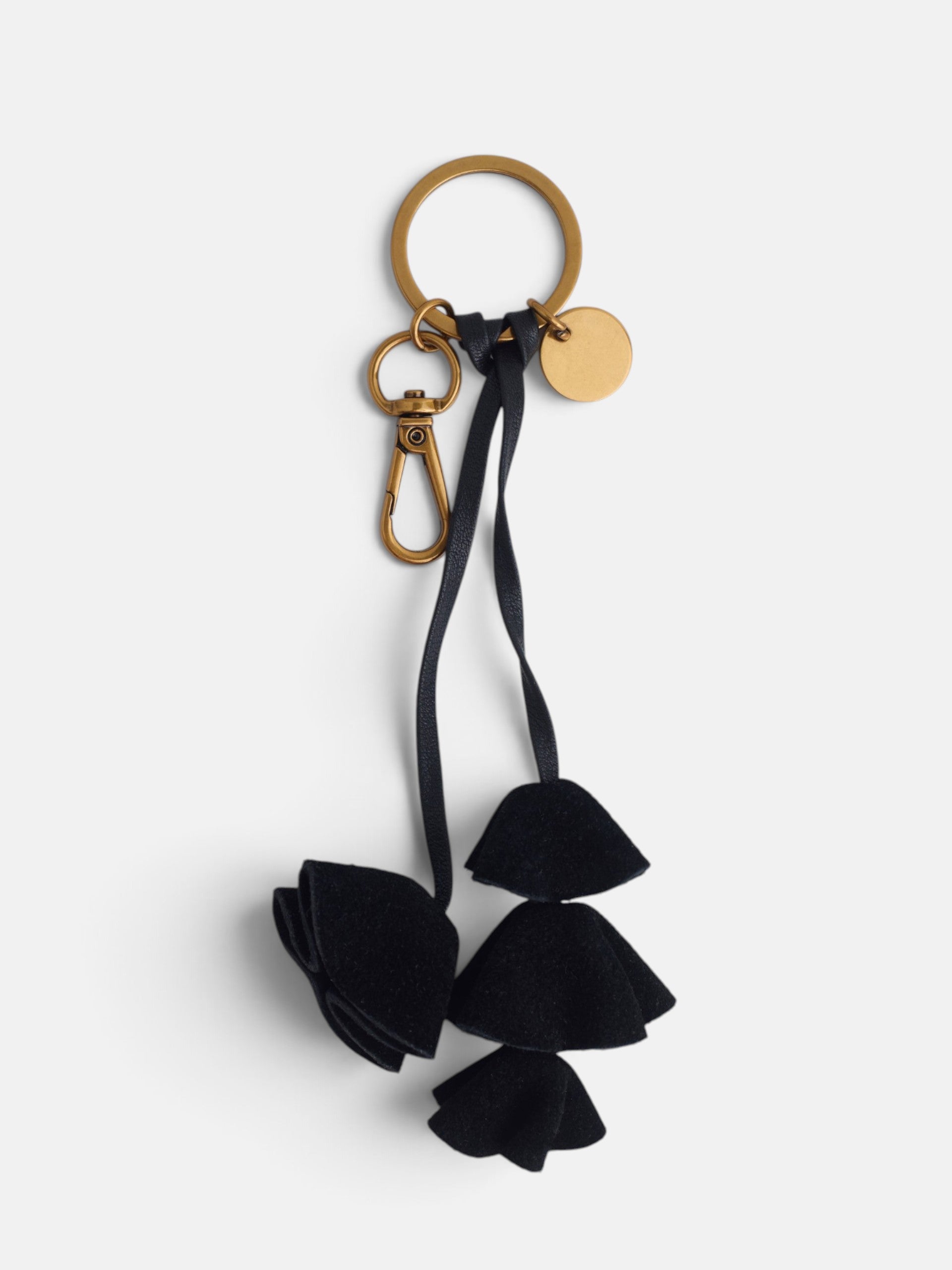 Llavero piel flores negro