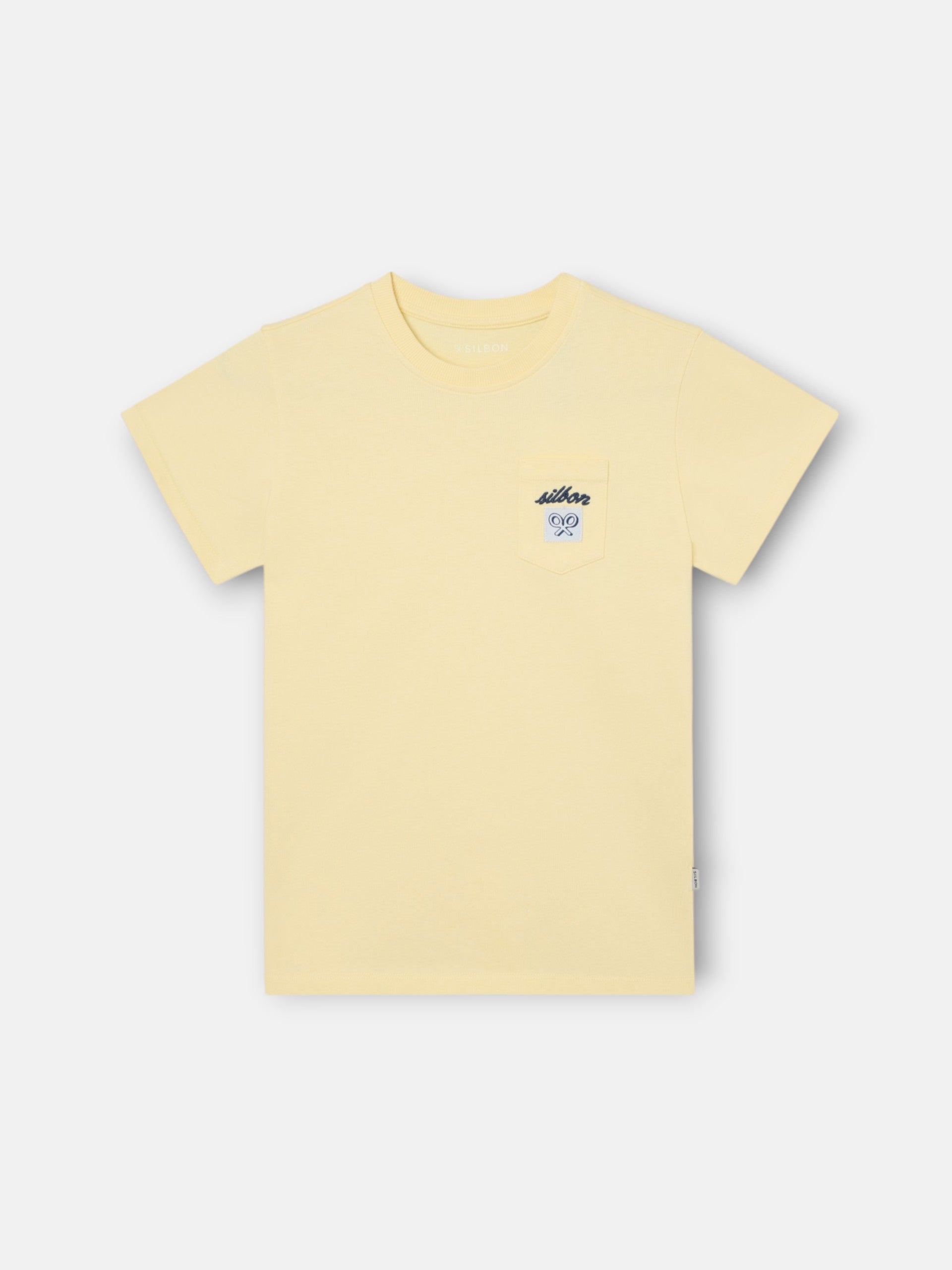 Camiseta kids bolsillo etiqueta amarilla