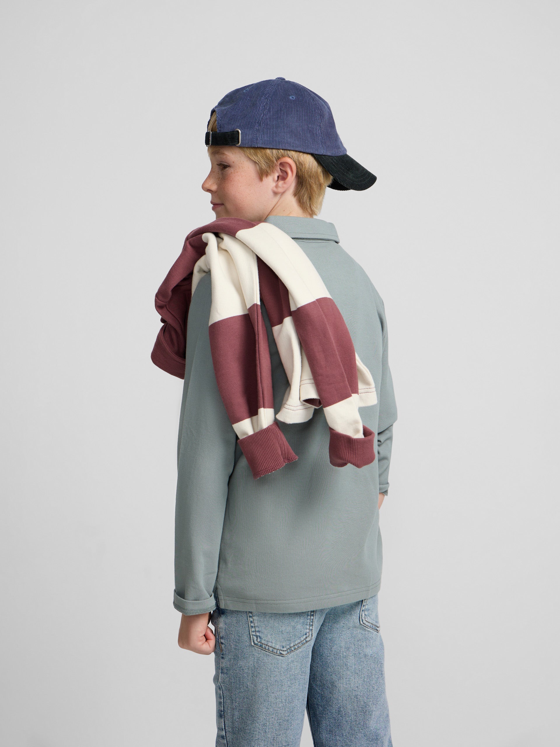 Green kids' polo with patches