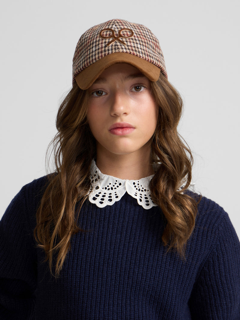 Navy blue girl's sweater with Peter Pan collar