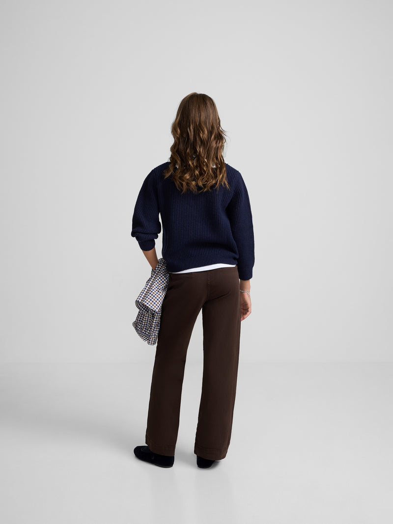 Navy blue girl's sweater with Peter Pan collar