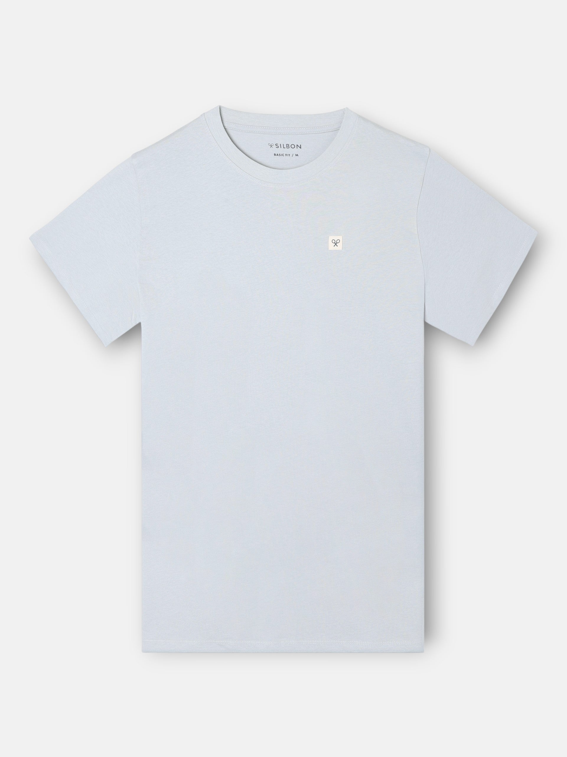 Camiseta lisa minilogo parche azul claro