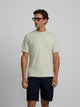 Camiseta lisa minilogo parche verde claro