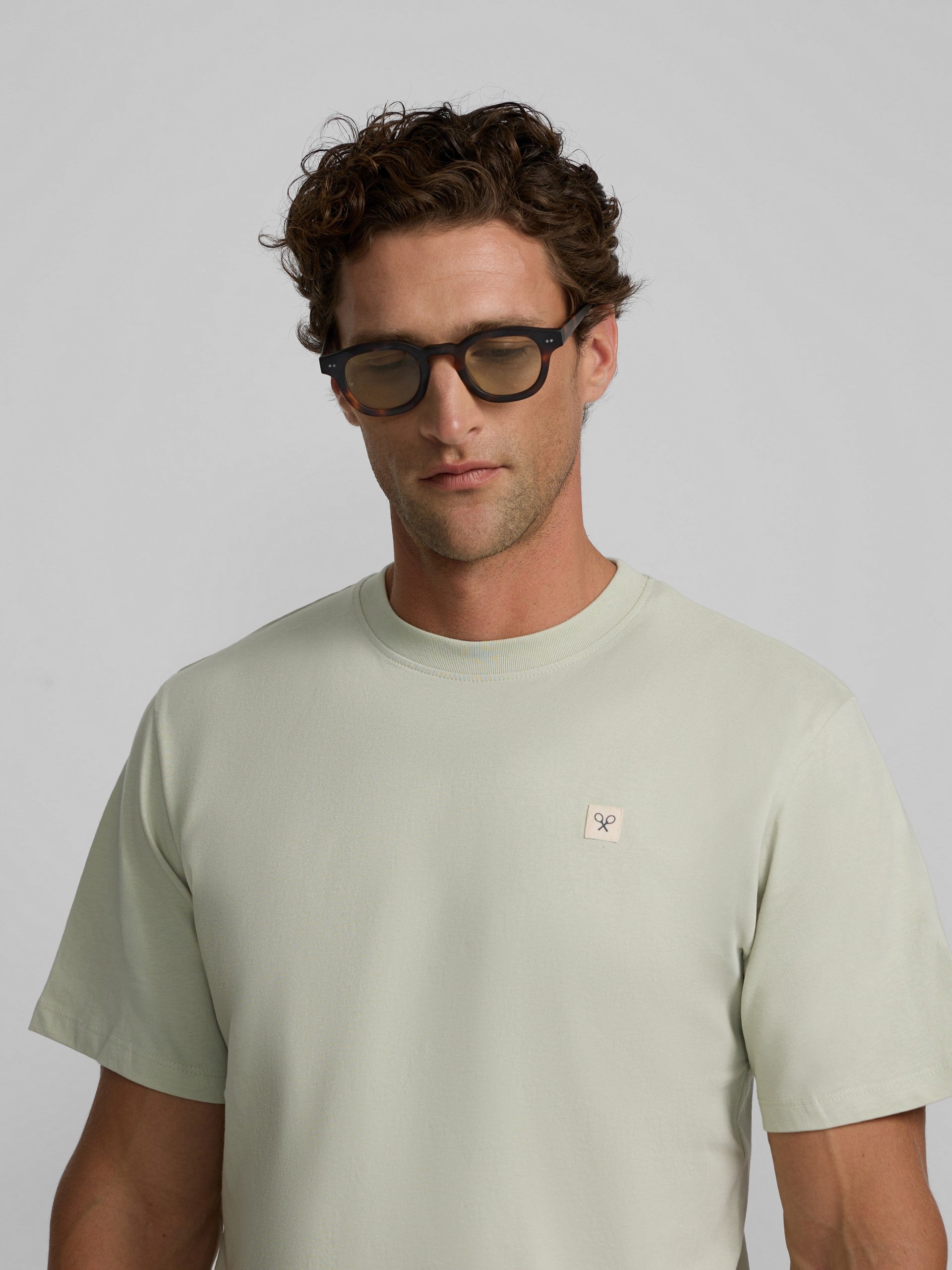 Camiseta lisa minilogo parche verde claro