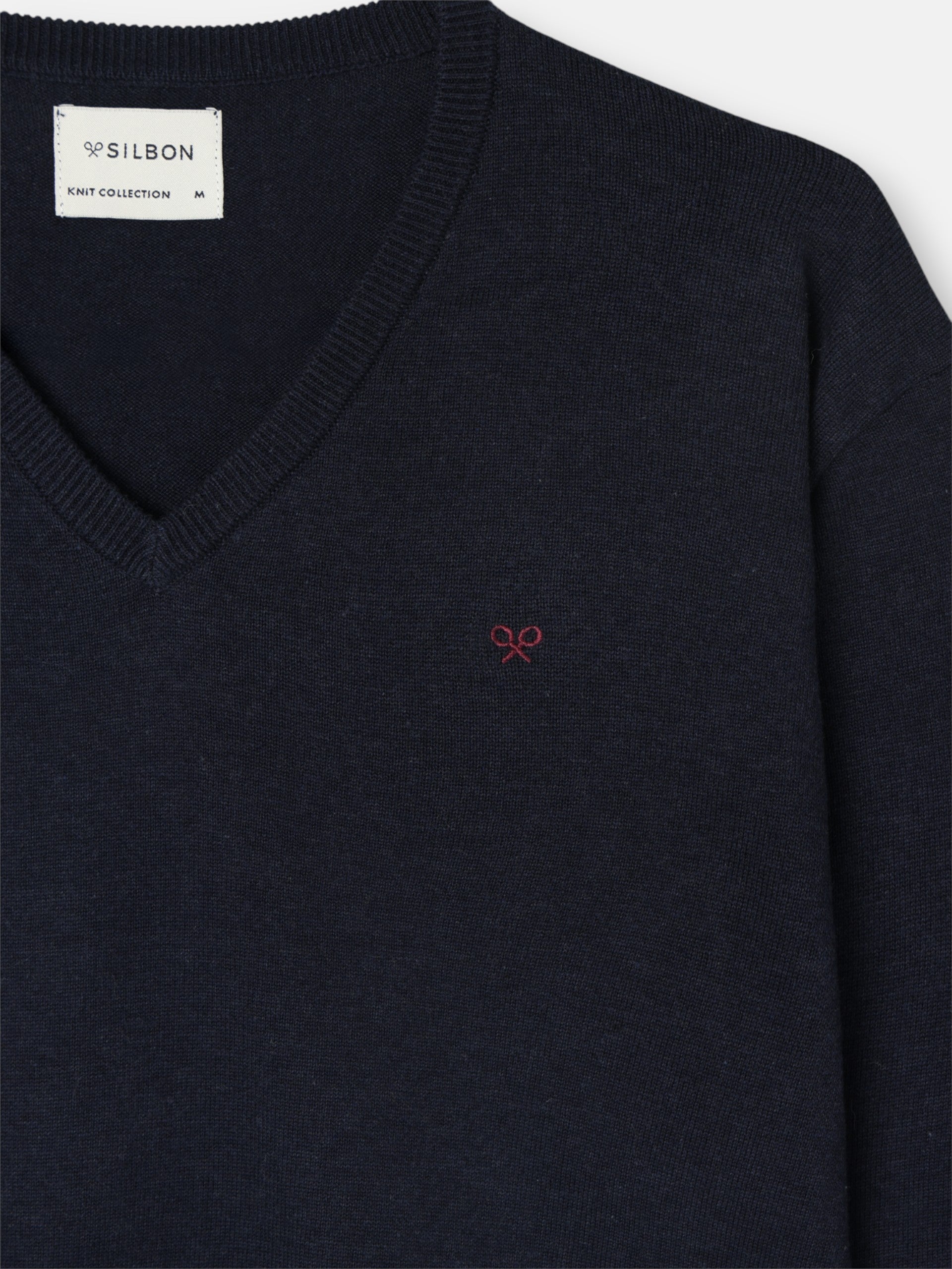 Pull uni col en V bleu marine