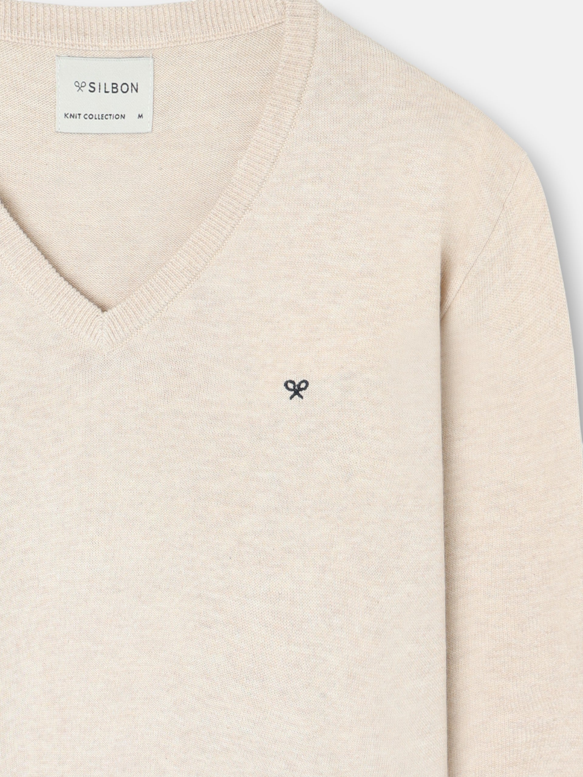 Pull uni col en V crème