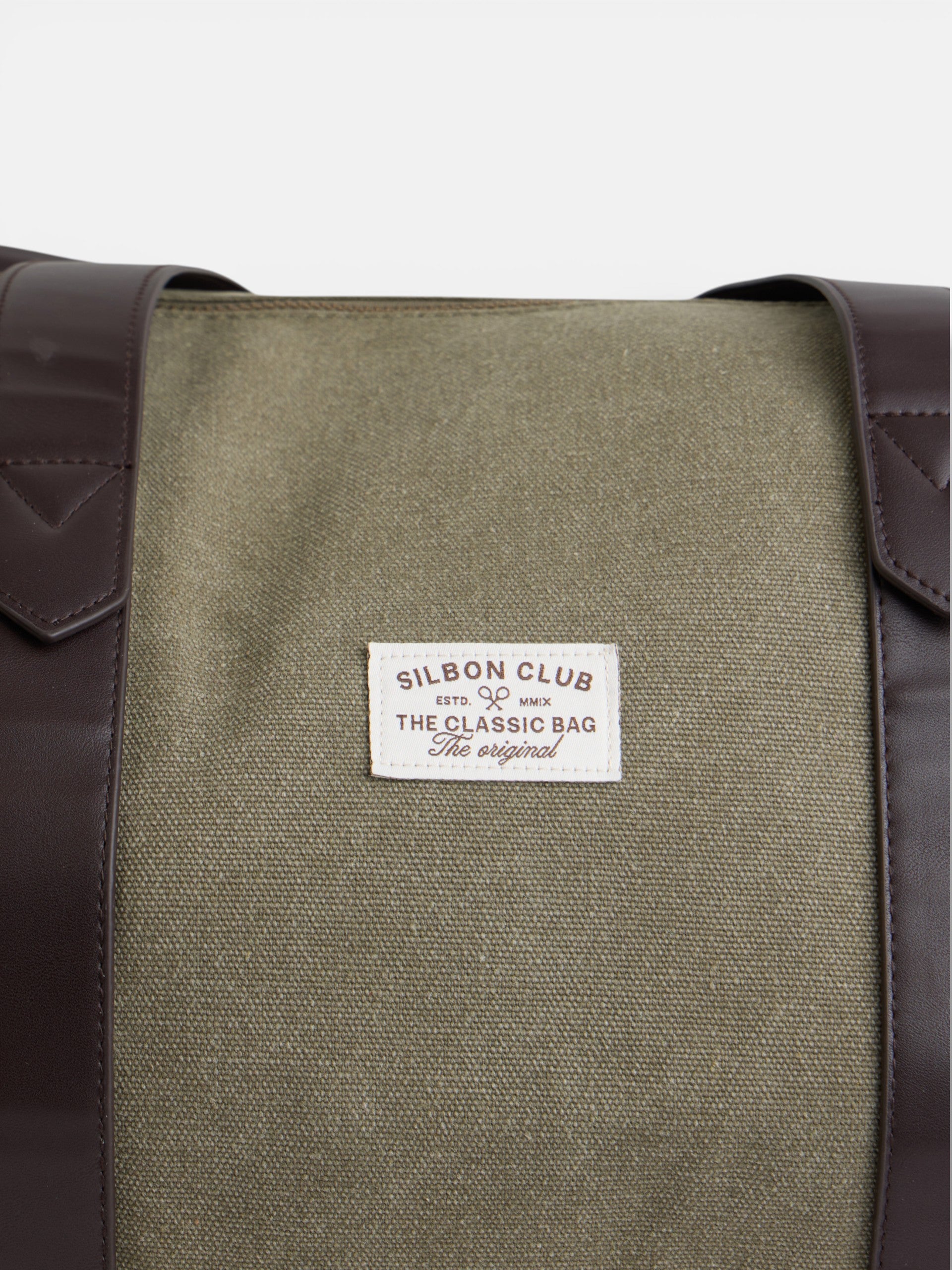 Sac de voyage avec détail en cuir vert