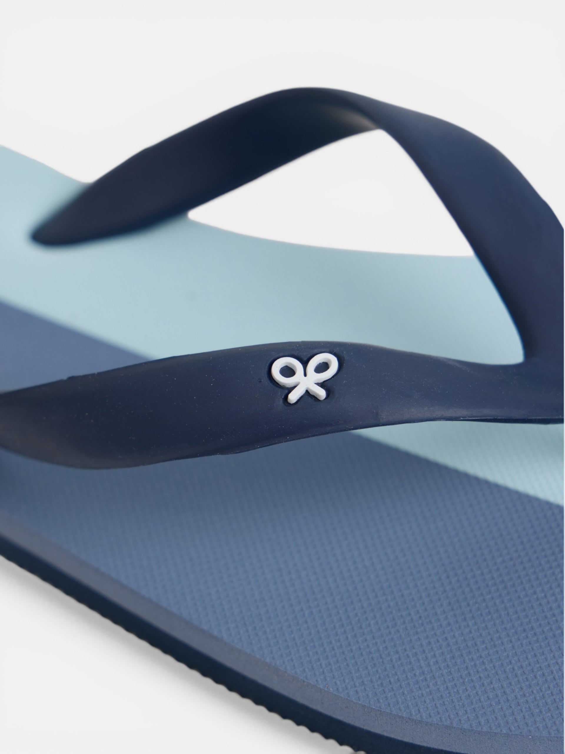 Two-tone blue paddle flip-flops
