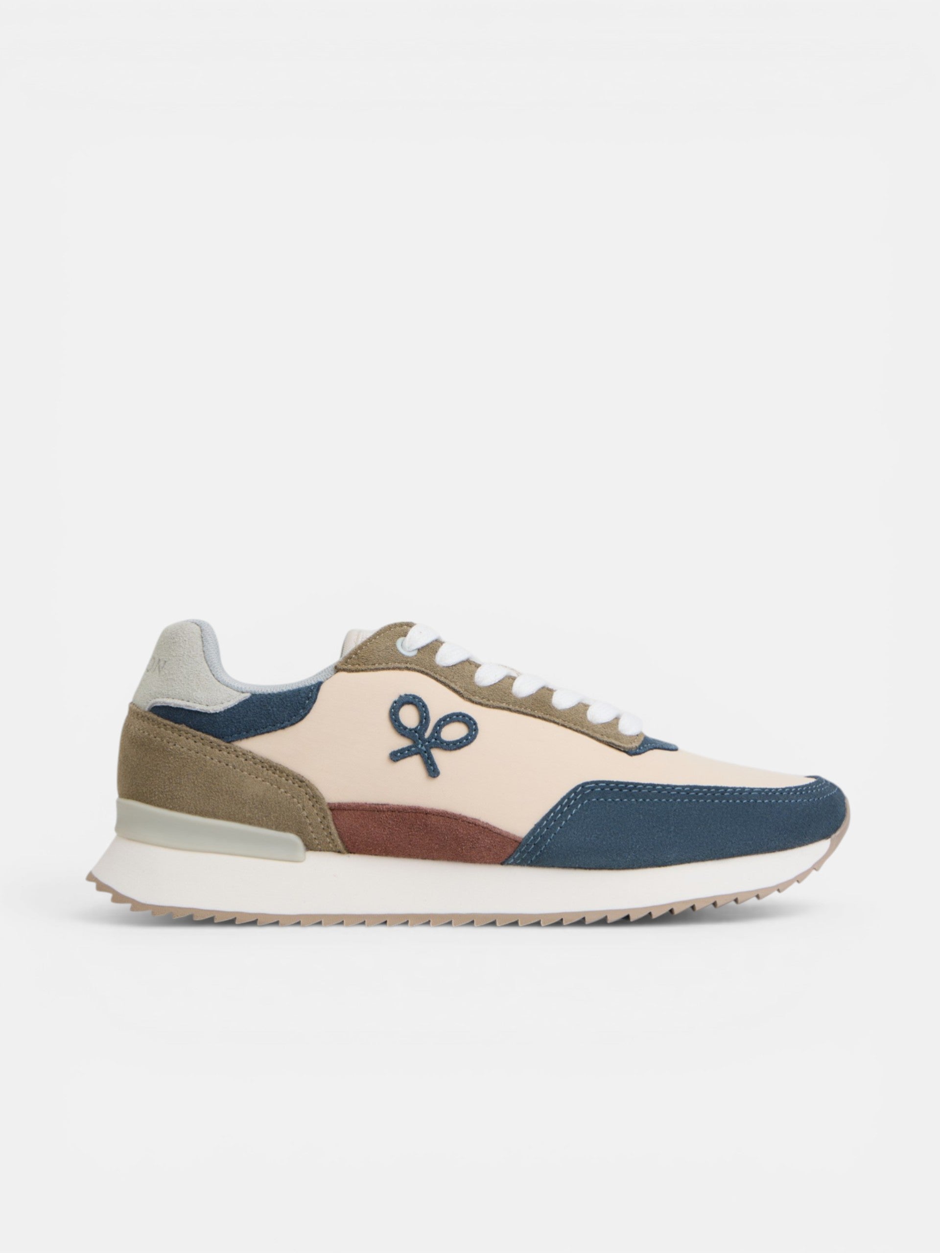 Zapatilla running raqueta beige