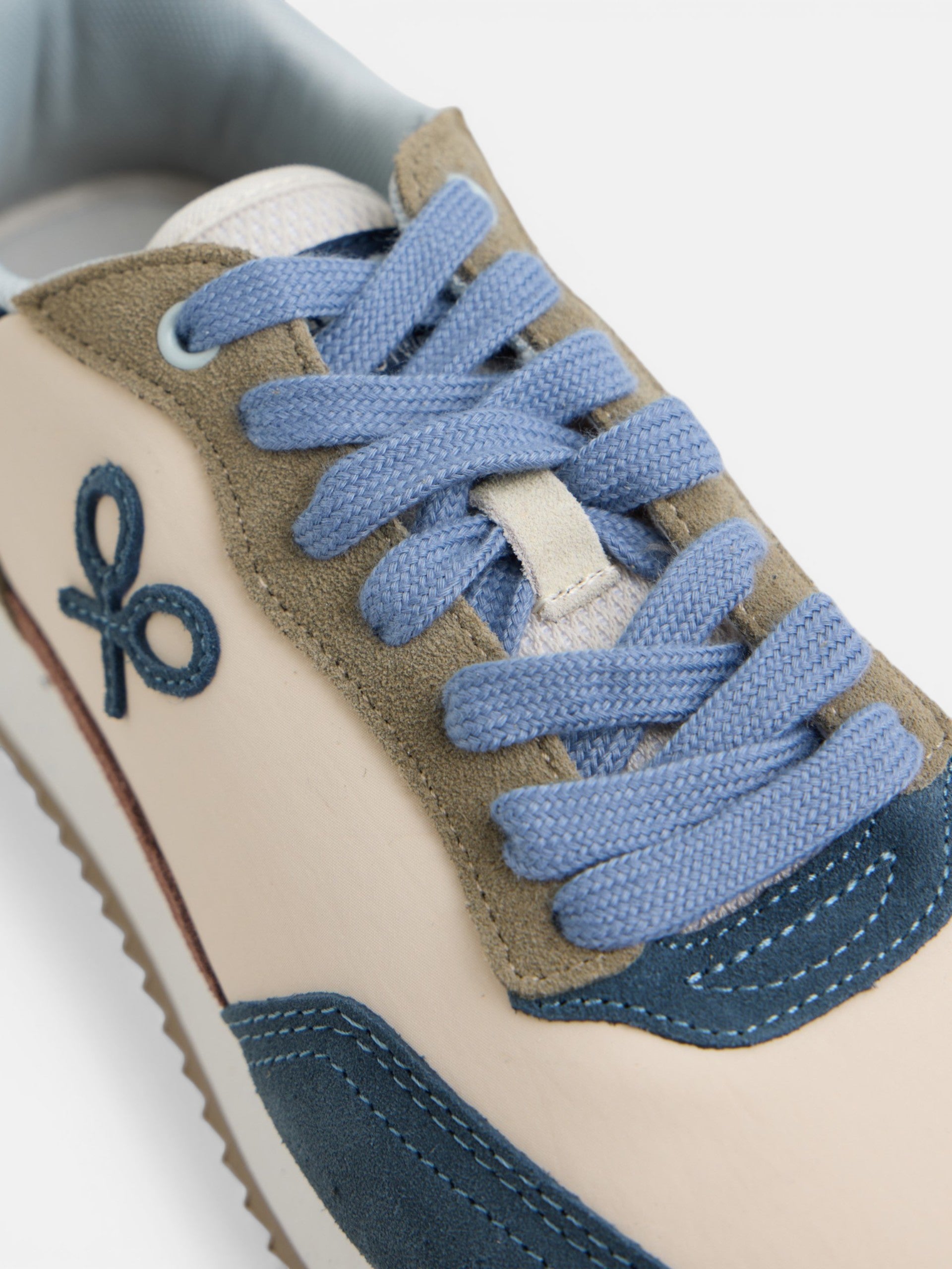 Zapatilla running raqueta beige