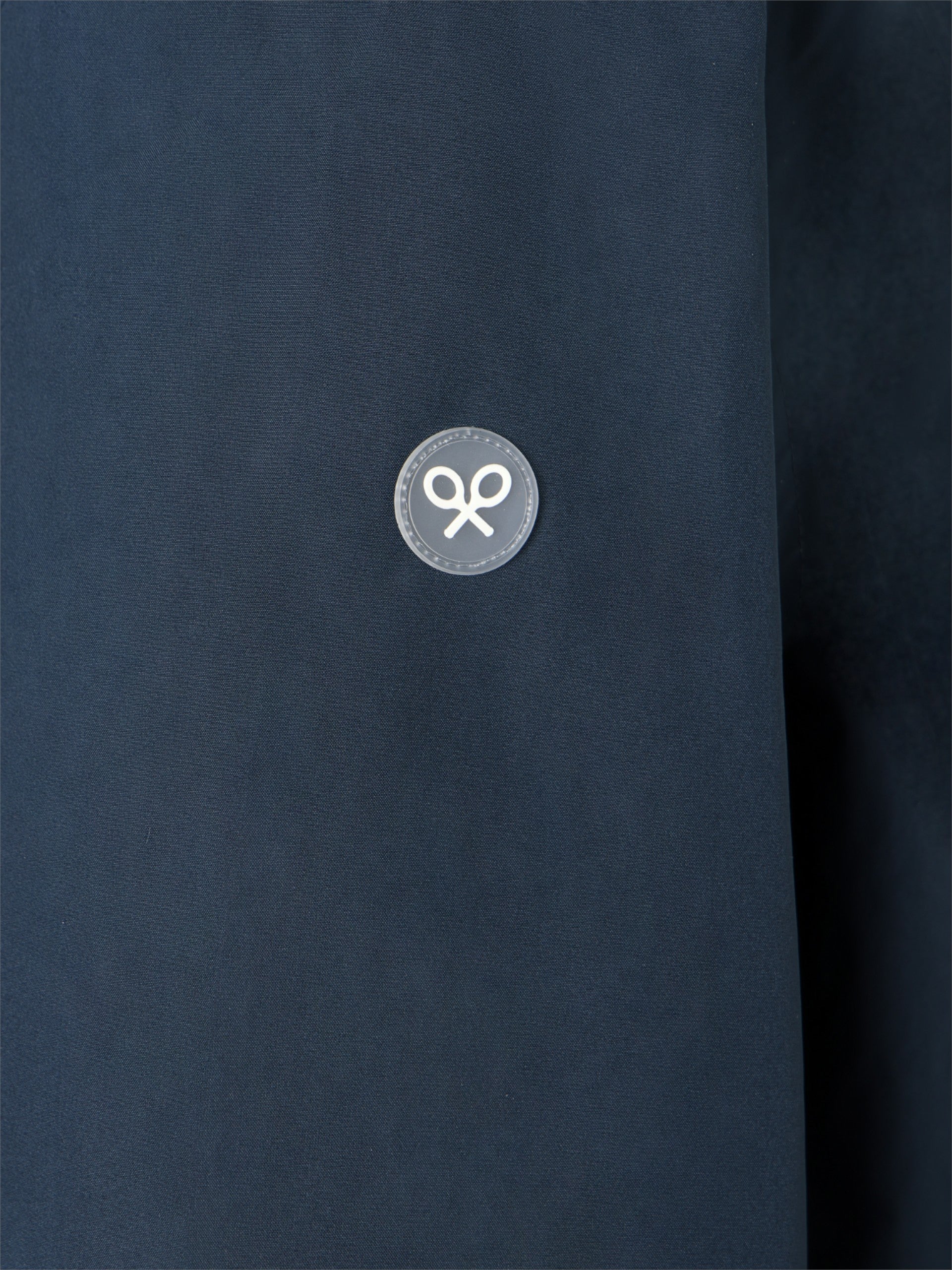 Technical windbreaker with navy blue hood