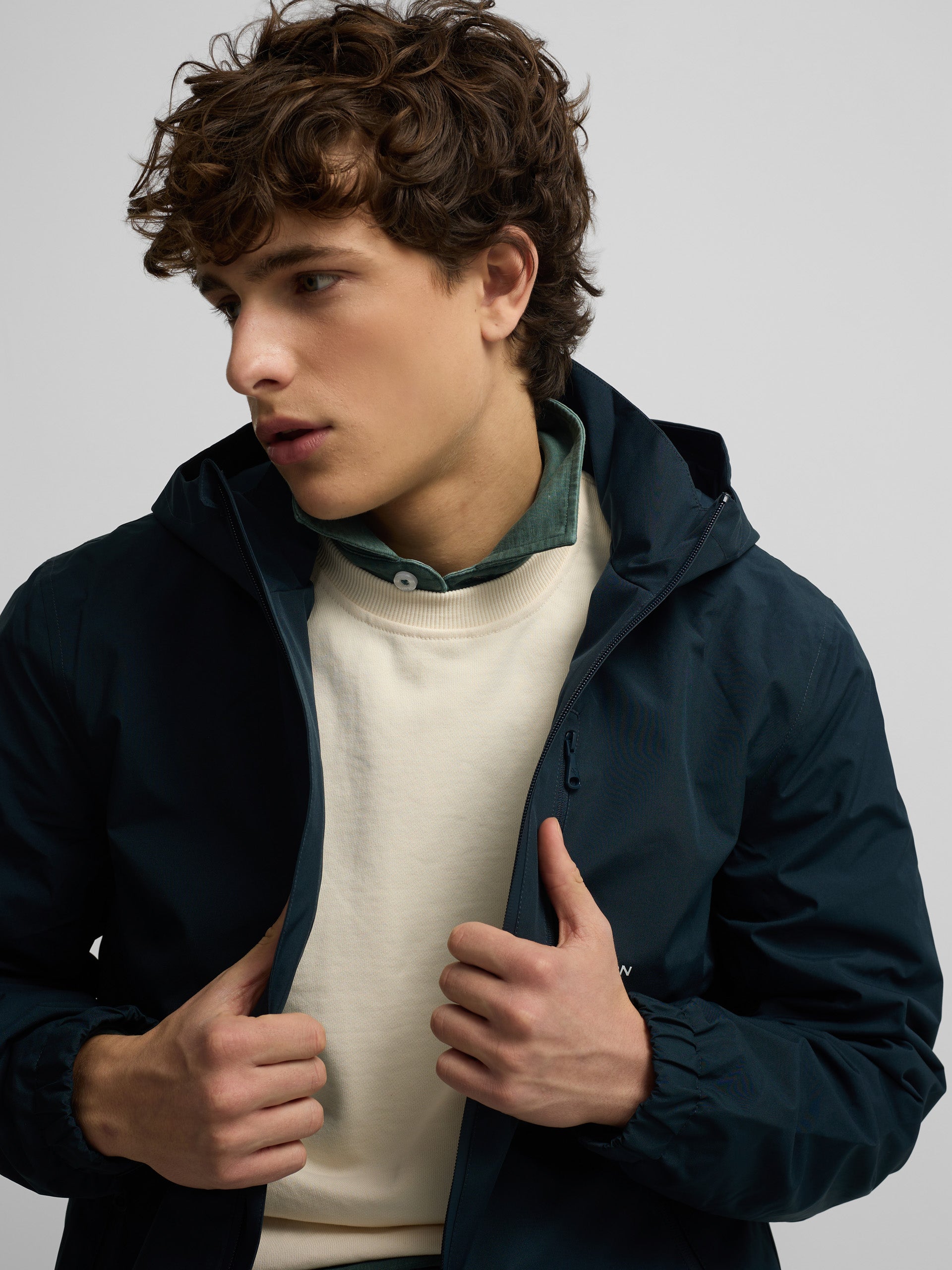 Technical windbreaker with navy blue hood
