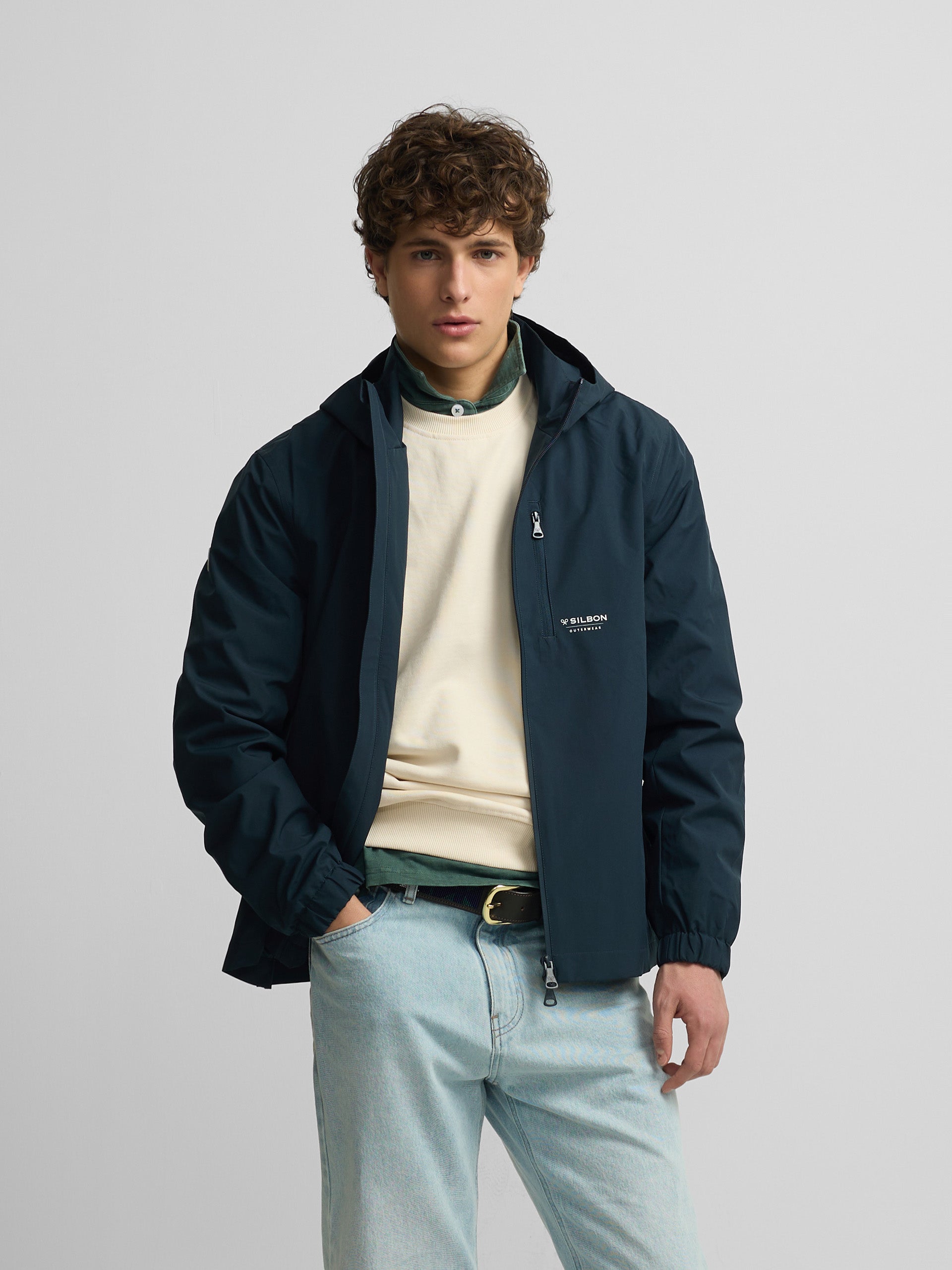 Technical windbreaker with navy blue hood