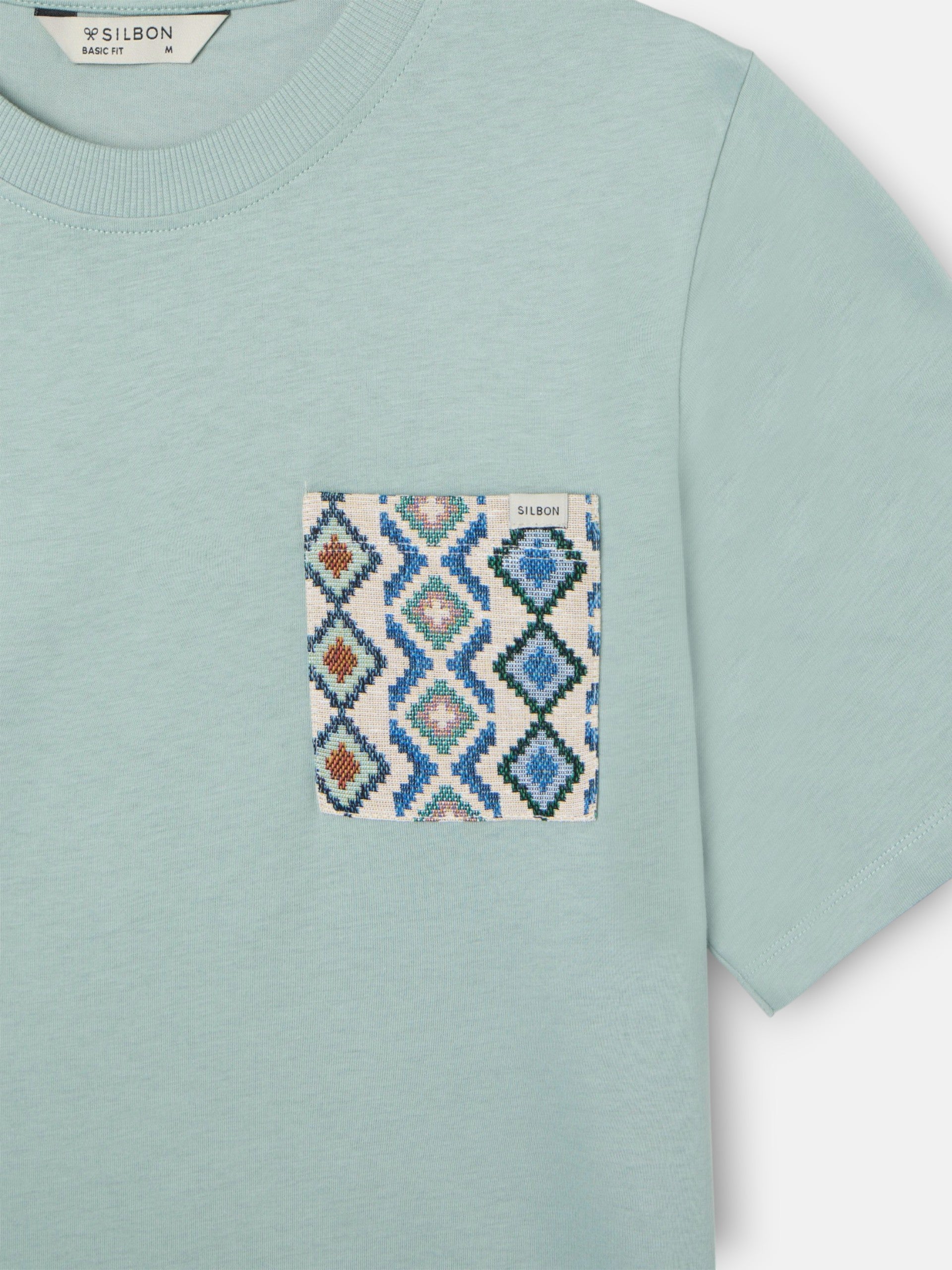 Camiseta bolsillo etnico verde