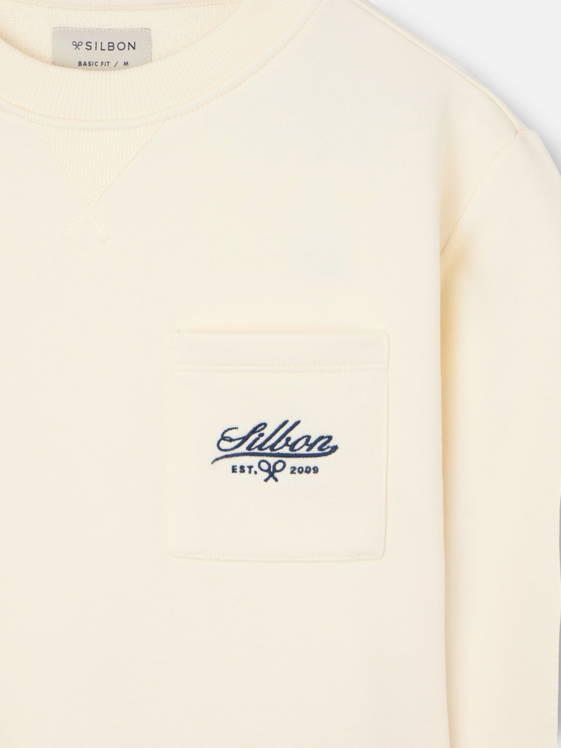 Sweat-shirt crème à poche brodée