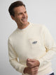 Sweat-shirt crème à poche brodée