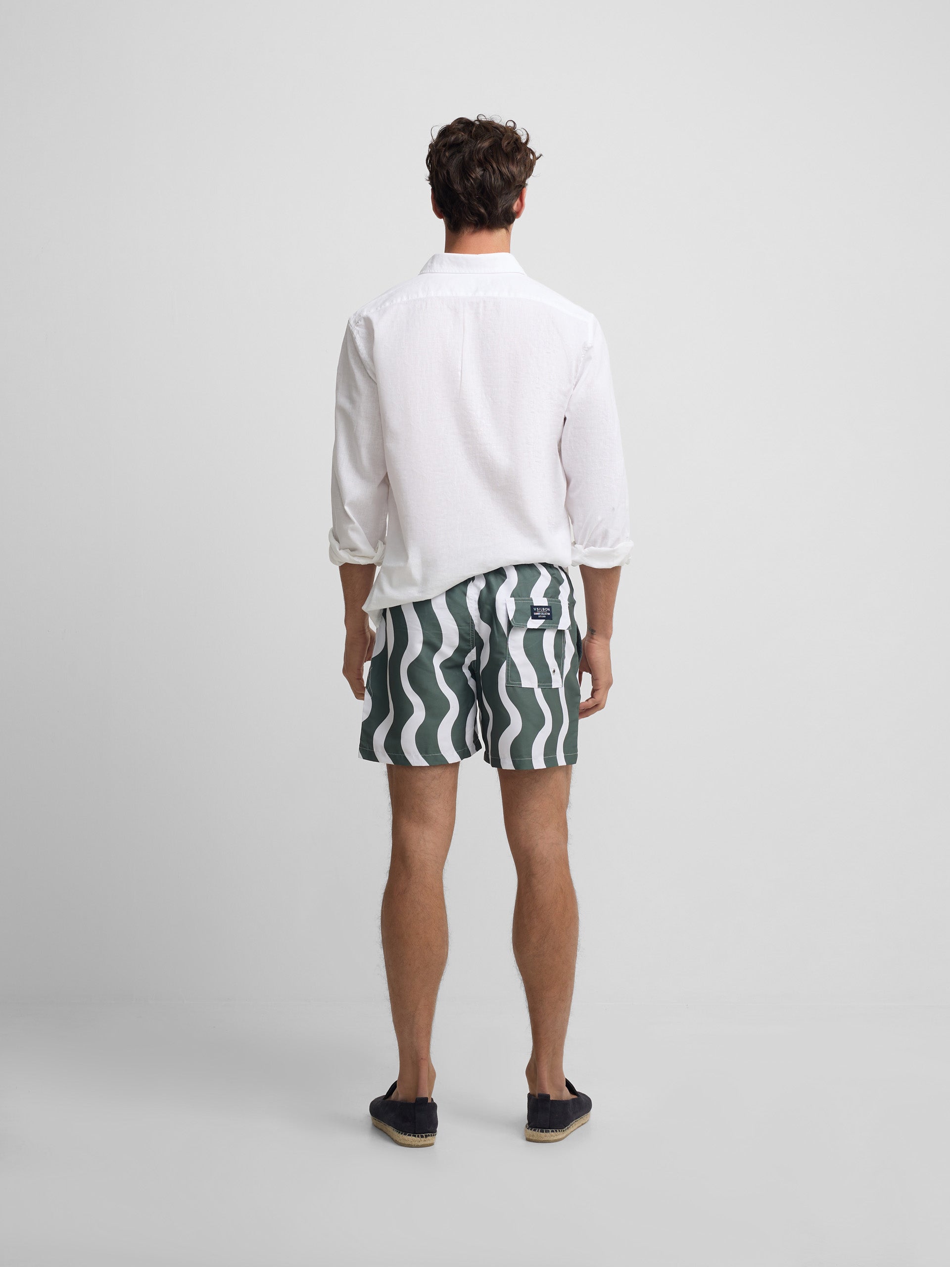 Maillot de bain bicolore vert à vagues