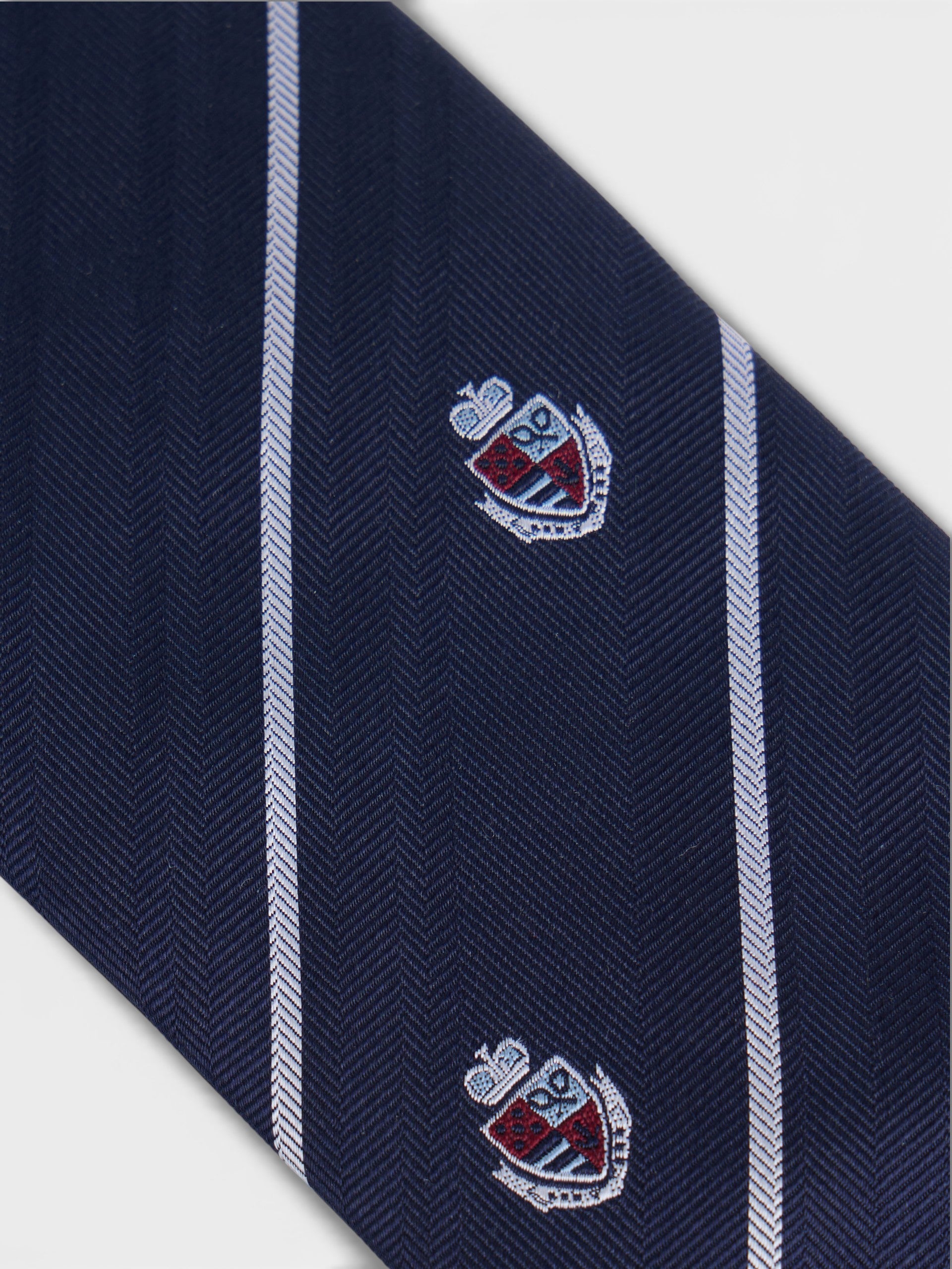Corbata rayas escudos azul oscuro
