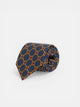 Corbata seda motivo geometrico flor amarilla