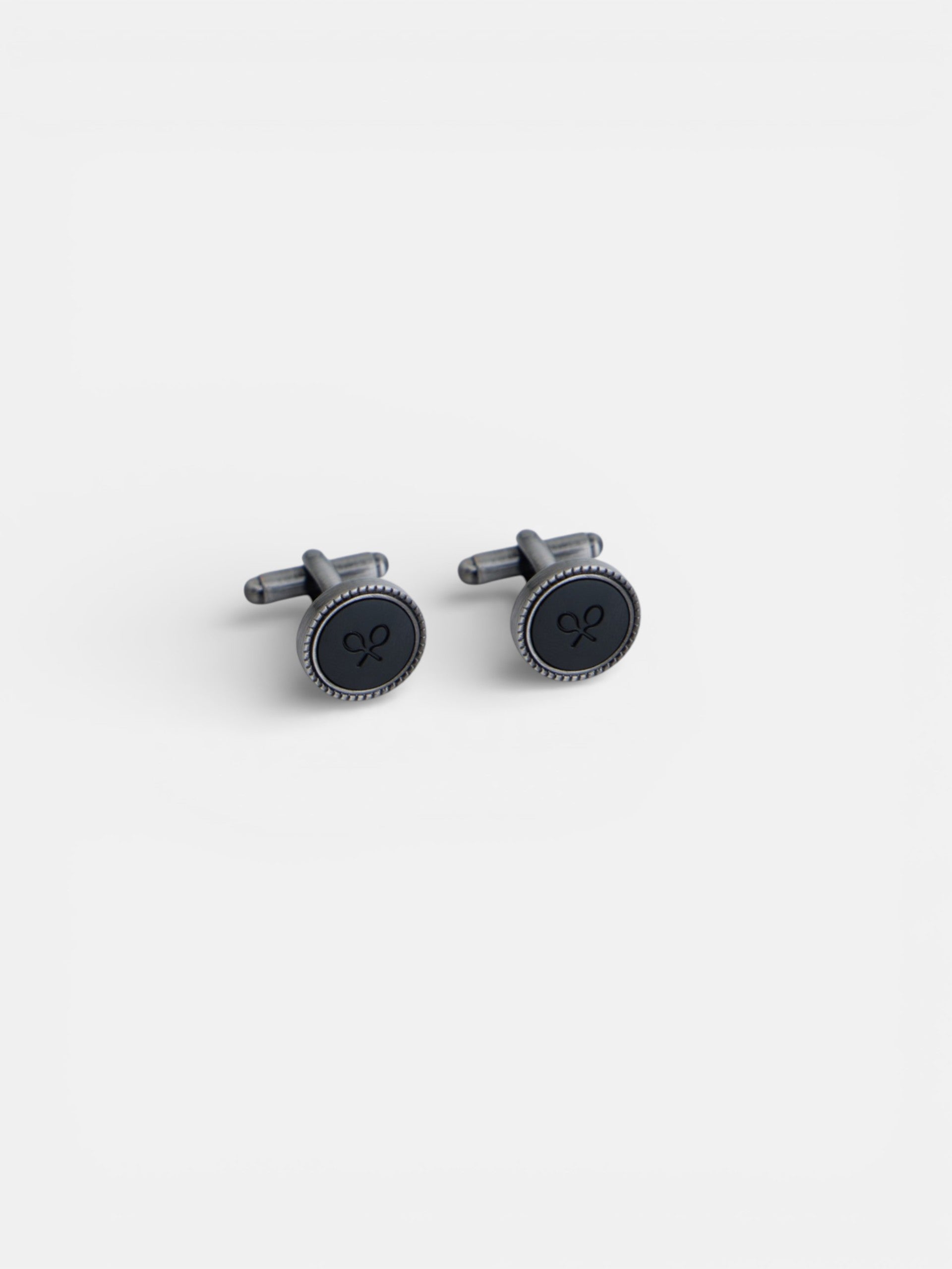 Classic cufflink with engraved rackets