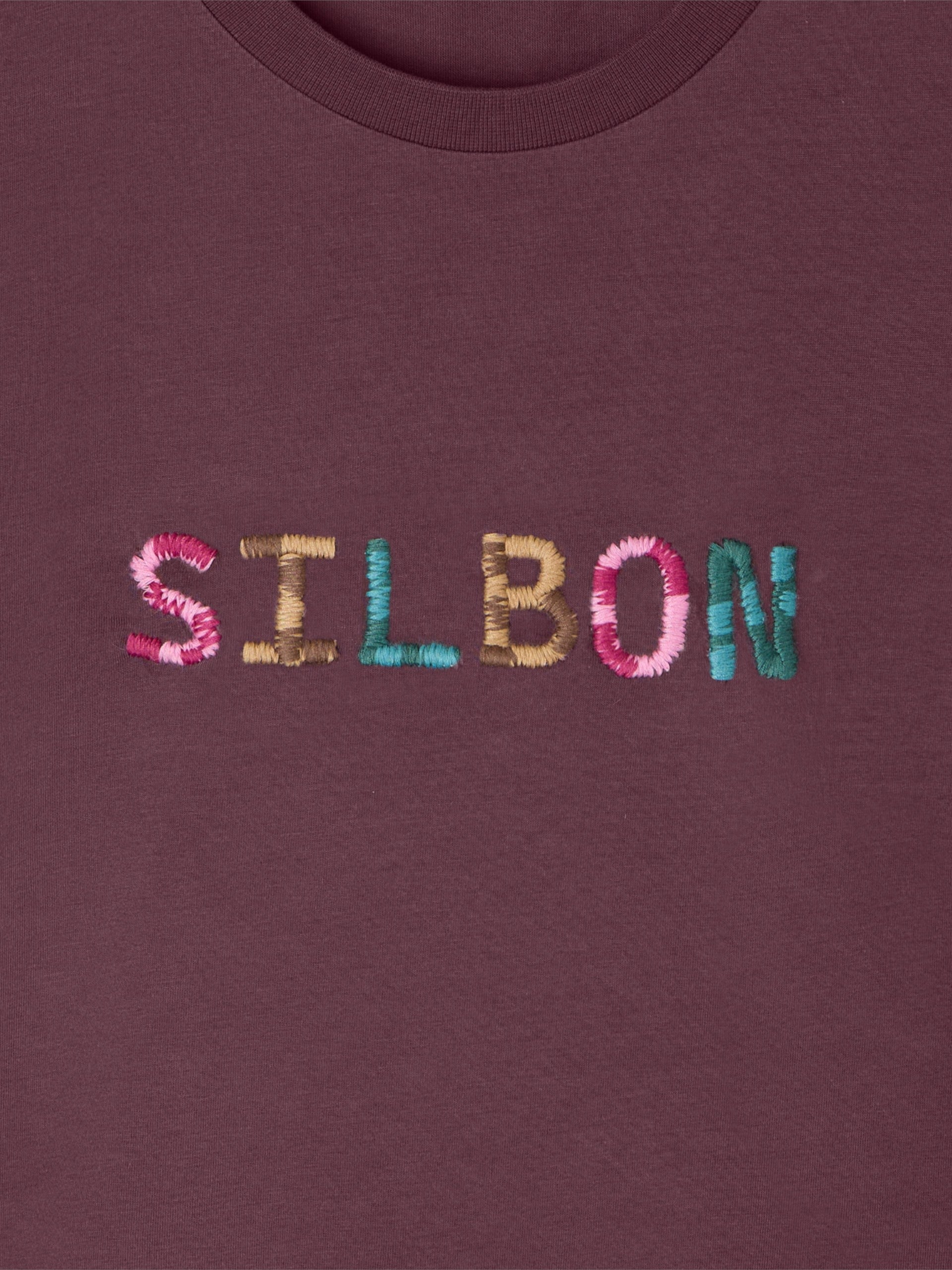 Camiseta woman silbon garabateado morada