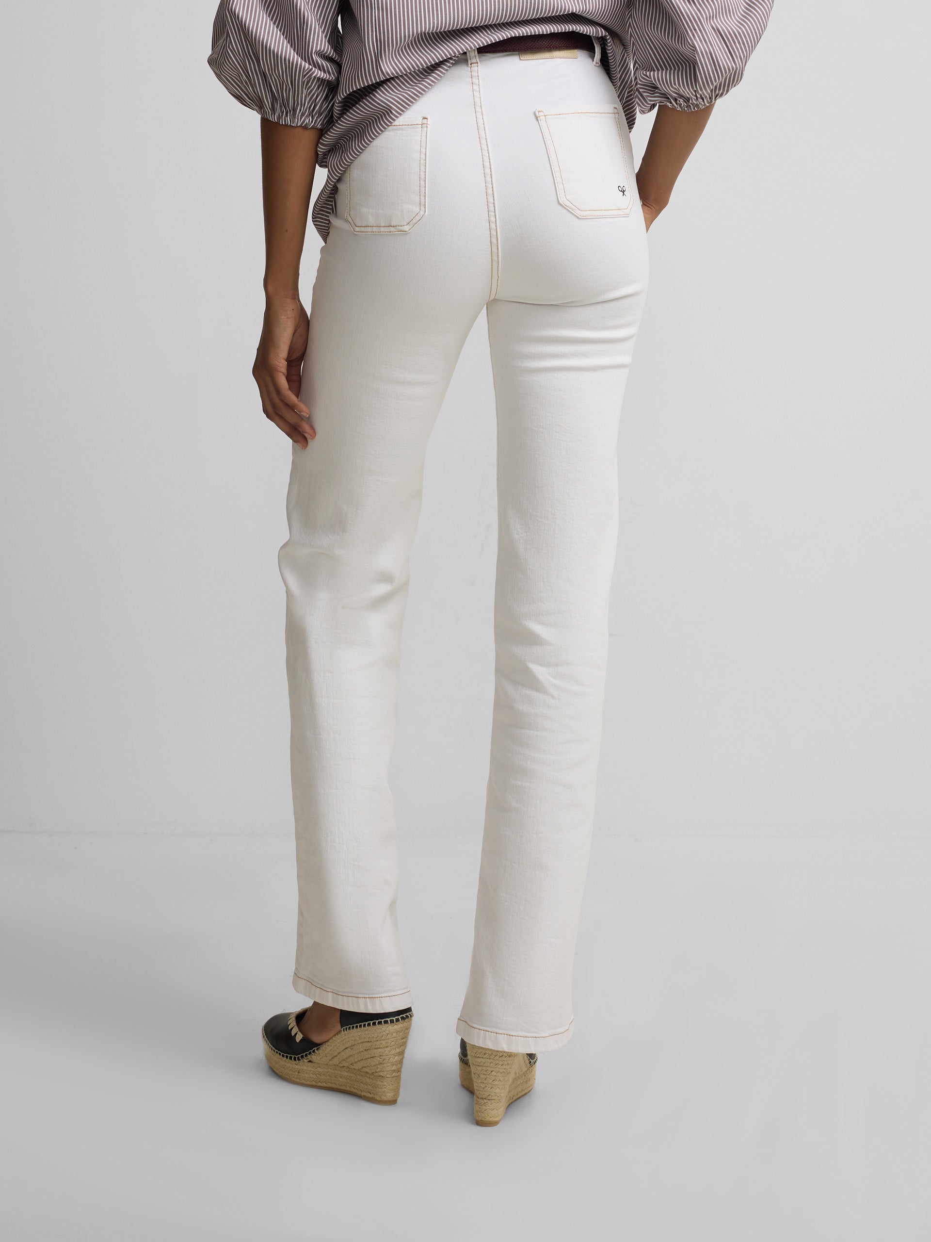 Pantalon denim hebillas blanco