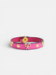 Pulseira de pele com logótipo e tachas rosa