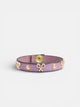 Pulsera piel logo y tachas malva